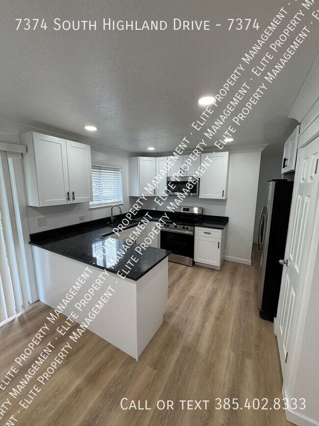 Building Photo - 7374 S Highland Dr