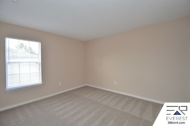 Building Photo - SPACIOUS, FULLY FENCED 4/2.5/2 IN DESIRABLE MATANZAS WOODS