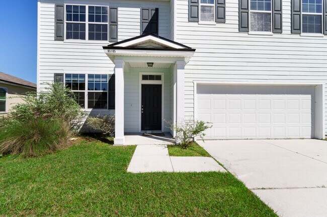 Building Photo - Spacious 5-Bedroom Home  – Prime Amelia Concourse Location!