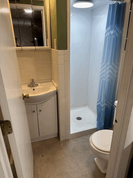 Bathroom with the shower. - 834 S Walnut St