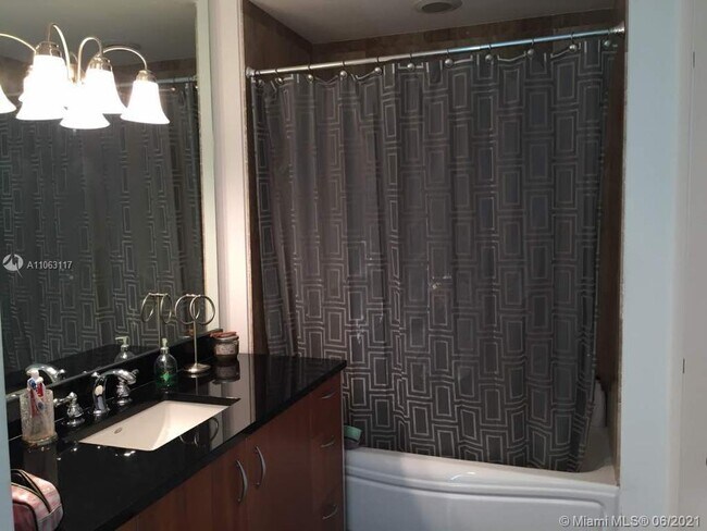 Building Photo - 300 S Biscayne Blvd