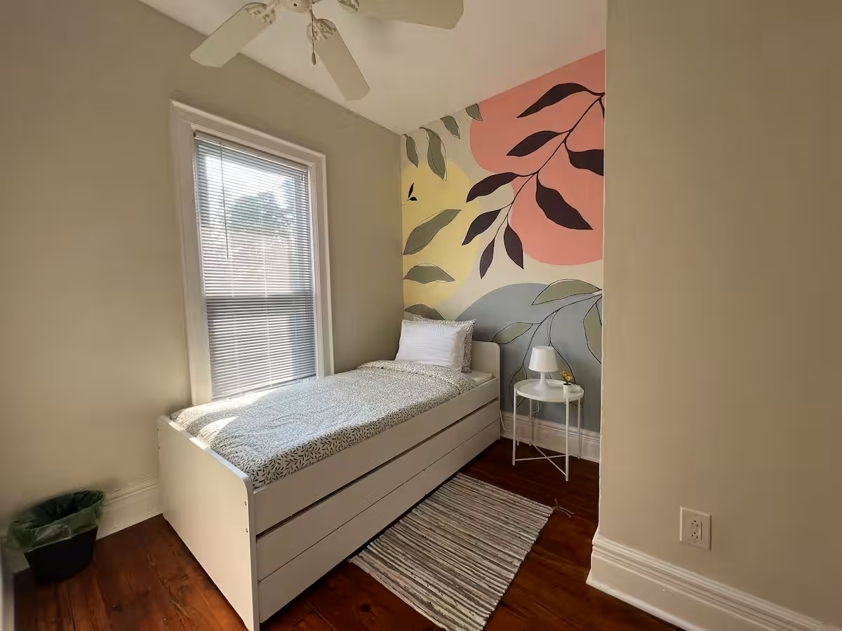 A great place to enjoy a football game. Bedroom #3 features twin bed with bonus pull out twin bed. - 203 W Tupper St