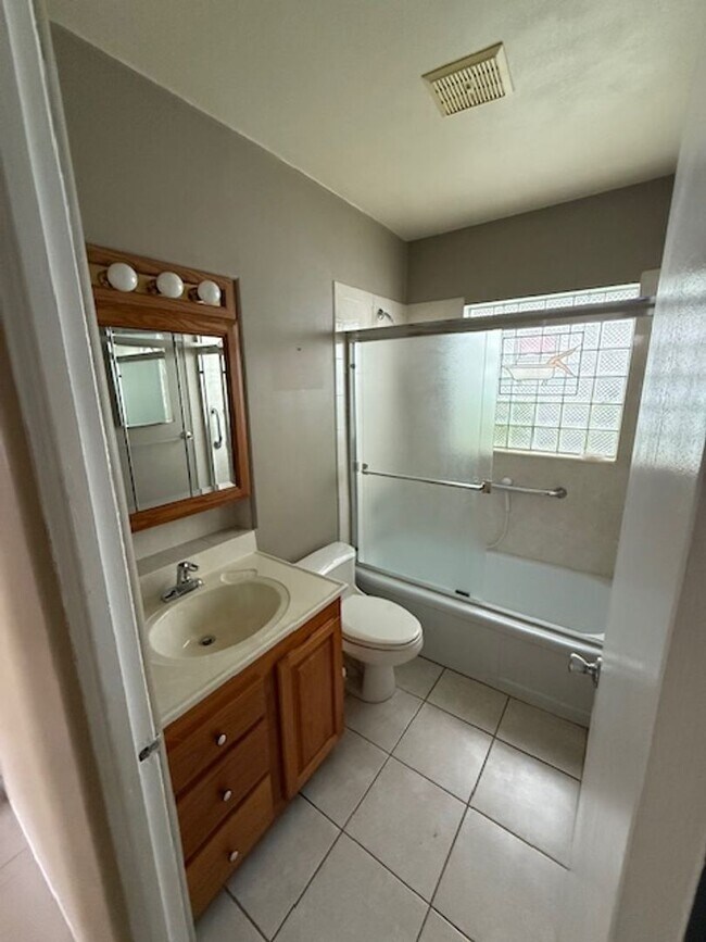 Building Photo - Well maintained 2/2 with a large yard in a...