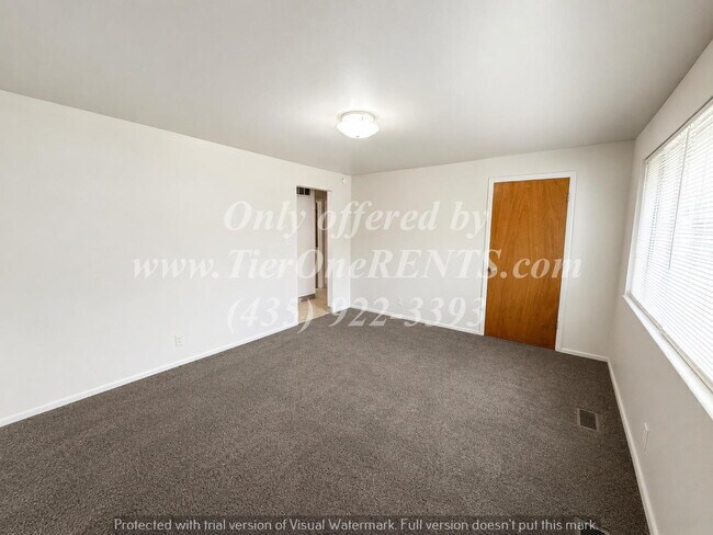 Building Photo - NO DEPOSIT option available for qualified renter!