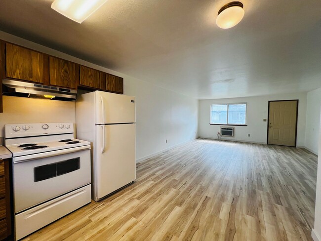 Building Photo - Non-Refundable & Security Deposit Total: $1300.00