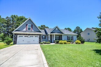 Building Photo - 4 Bedroom 2 Bathroom- Small Pets Considered