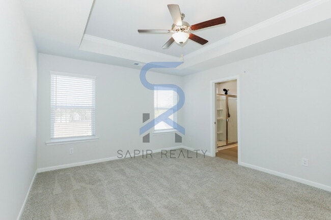 Building Photo - Move in before February 28th and choose your reward: a $250 Amazon Gift Card or a 55" Smart TV!