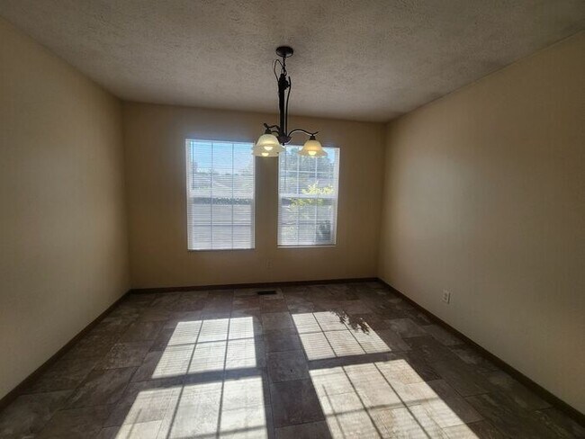 Building Photo - Enjoy comfortable living in this spacious all-electric home