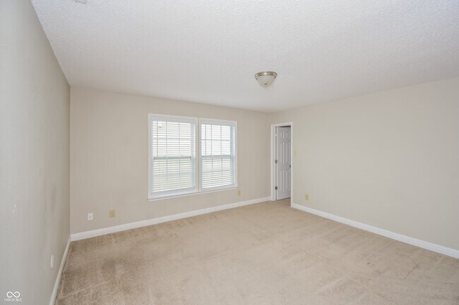 Building Photo - 8208 Firefly Way