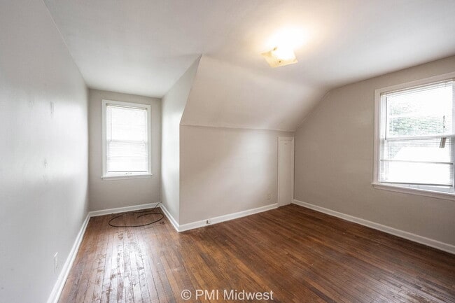 Building Photo - "Charming 2-Bedroom Duplex with Gleaming Hardwood Floors in Indy!"