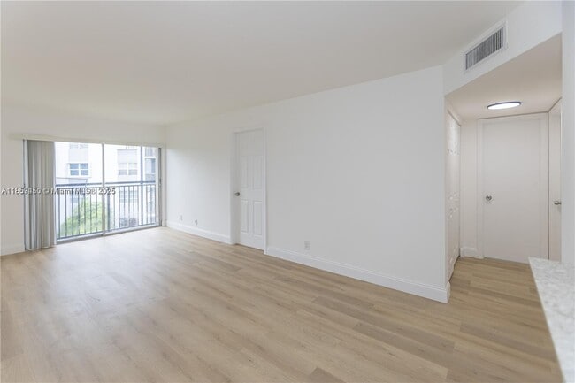 Building Photo - $2,100MONTHLY;8740 N SHERMAN CIR. #408 MIR...