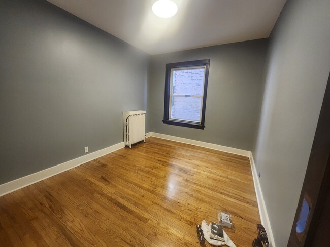 Building Photo - 10954 S Vernon Ave