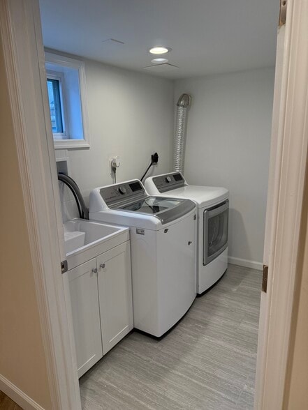 Laundry Room and storage area - 4915 Strathmore Ave