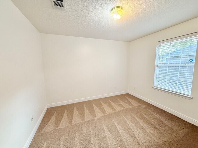 Building Photo - Spacious 4-Bedroom, All-Brick Home