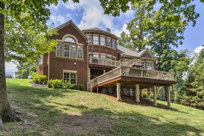 Building Photo - Fully Furnished 4 Bedroom, 3.5 Bath w/ 3 Car Garage and Unfinished Basement in Governors Club