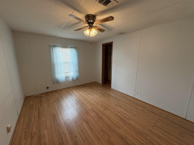 Building Photo - charming 3-bed, 2-bath home is located in the highly desired Strawberry Crest 55+ community