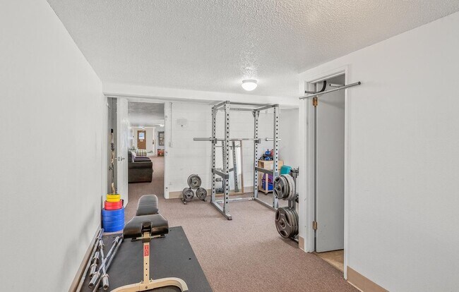 Building Photo - Spacious 2-Bedroom Condo with Forest Views, Private Balcony, In-Unit Laundry & Community Amenitie...