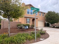 Building Photo - New flooring & paint!  Large backyard - landscaped and ready for garden!   Community pool, fitnes...