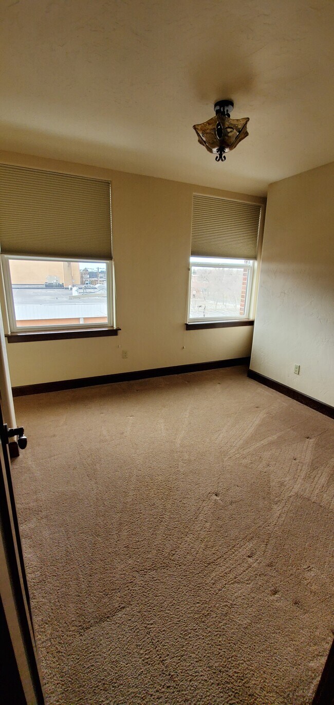 bedroom 1 with sliding door closet - 503 1st Ave N