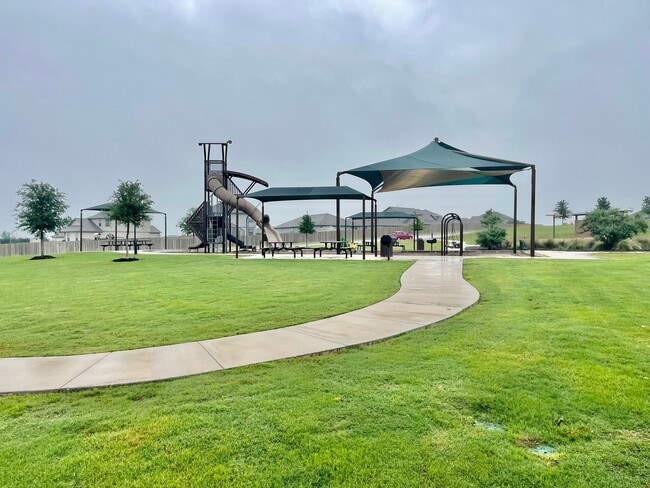 Building Photo - 4 Bedroom home in Cottonwood Creek w/ Fenced backyard