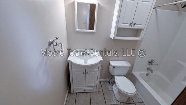 Building Photo - 3/2 Brick House, Deck, Storage & Fenced Yard