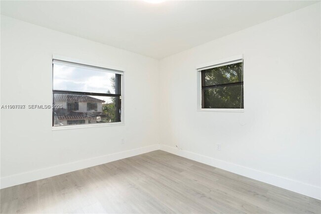 Building Photo - 6080 W 26th Ct