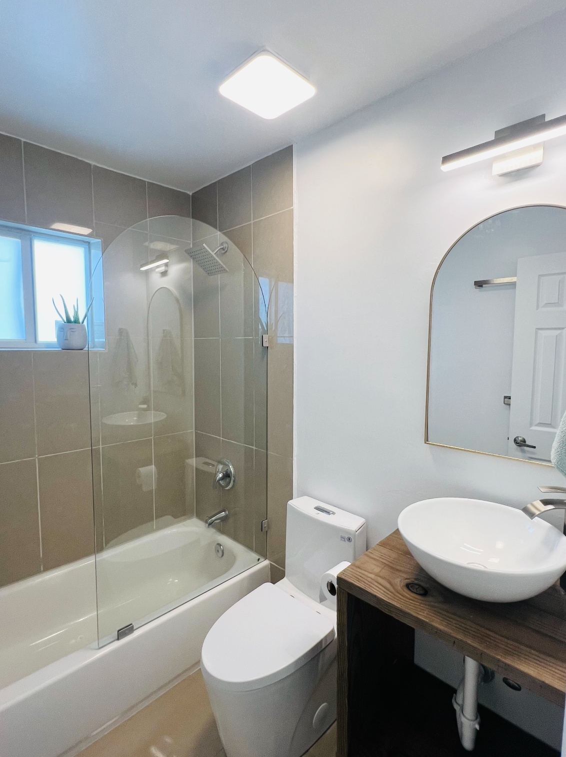 Modern bathroom with window - 6863 NW 2nd Ave