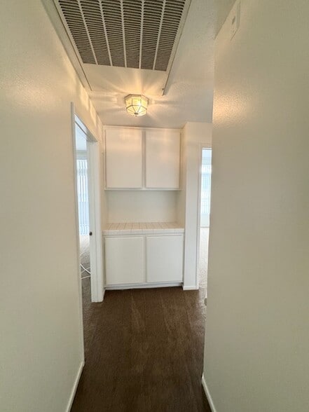 Hallway to bedrooms and bathrooms - 4581 Warner Ave