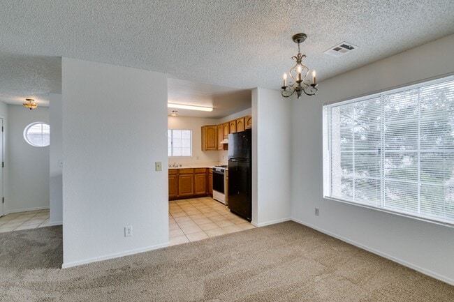 Building Photo - Charming Second-Floor Condo with Two Bedrooms and Fireplace