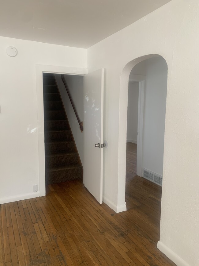 Living room and stairs to upstairs bedroom - 1330 Elm Ave