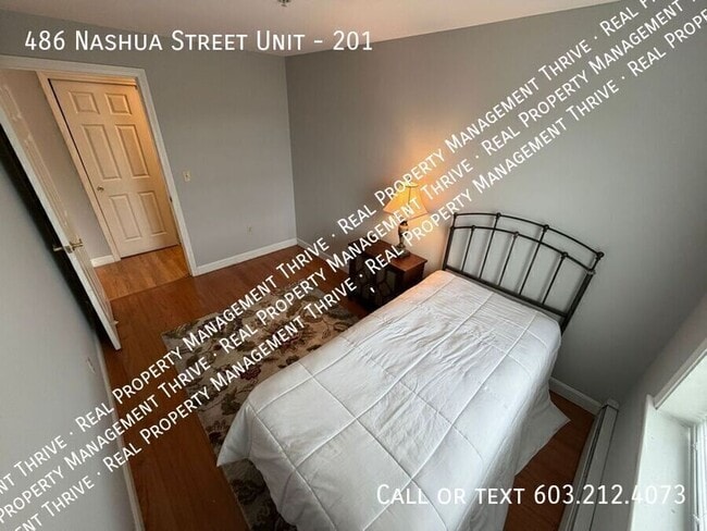 Building Photo - 486 Nashua St