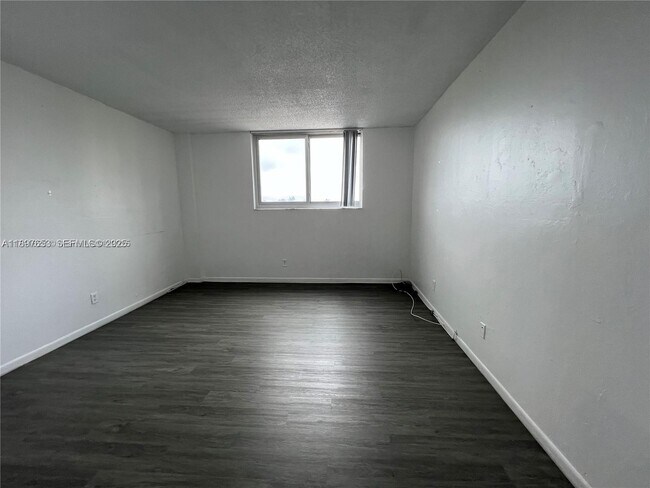 Building Photo - 19380 Collins Ave