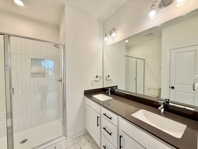 Building Photo - **OFFERING 1/2 OFF FIRST MONTH'S RENT** Newly Built 4BD, 3.5BA End-Unit Raleigh Townhome in a Gre...