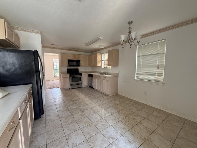 Building Photo - 13834 Trumpetvine St