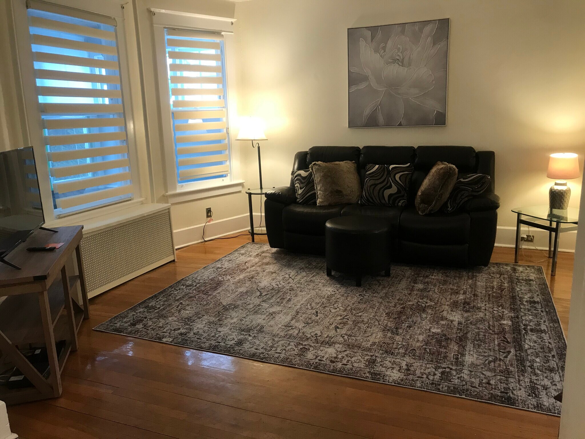 Living room with leather couch and 40 inch TV - 36 Harris Ave