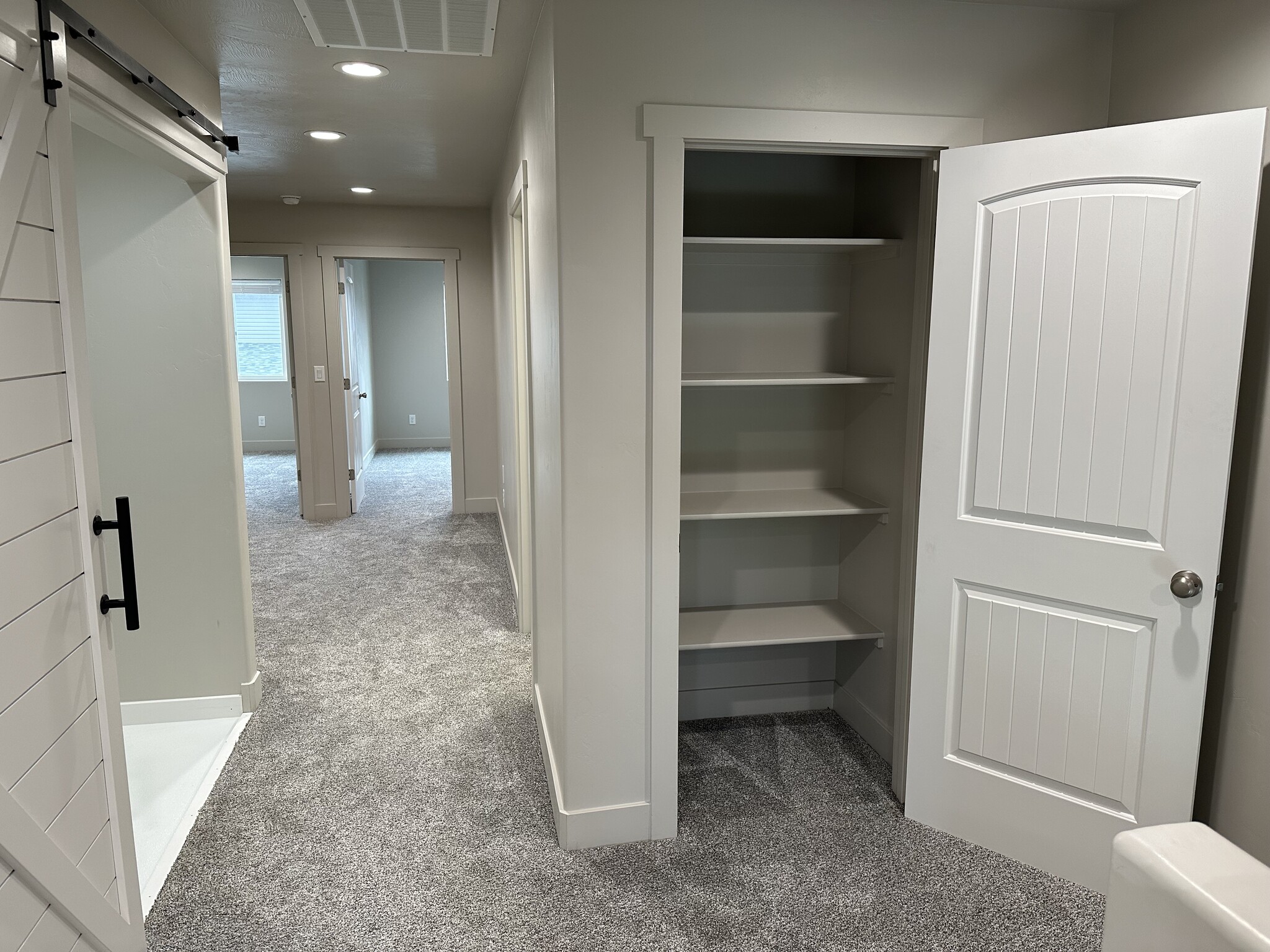 Linen closet by laundry - 187 Courthouse Way