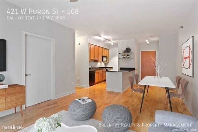 Building Photo - Stunning River North condo with Huge Patio!