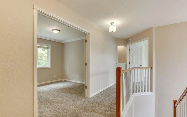 Building Photo - Spacious Four-Bedroom Home with Gourmet Kitchen, Multiple Living Areas, Loft, and Beautifully Lan...
