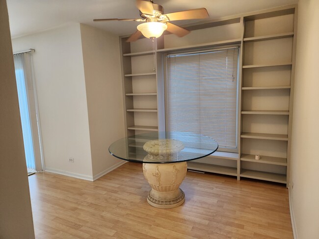 dining area with built in shelves - 1050 Holbrook Rd