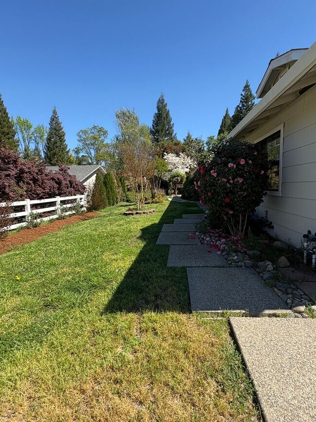 Building Photo - Your Private Escape – Charming Ranch-Style Home with Room to Breathe!