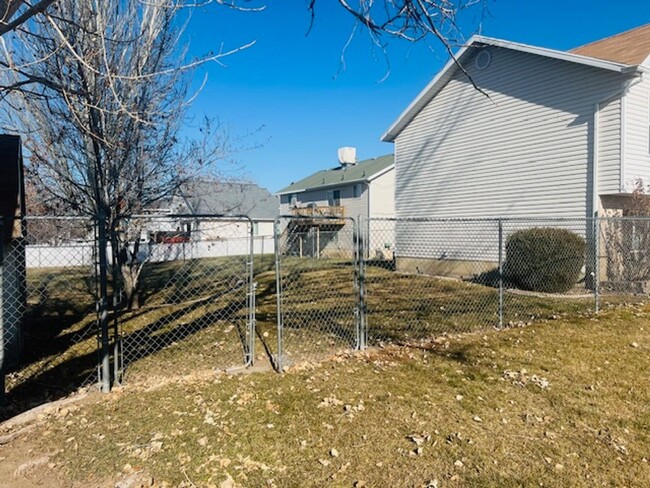 Building Photo - Beautiful remodeled home with fenced backy...