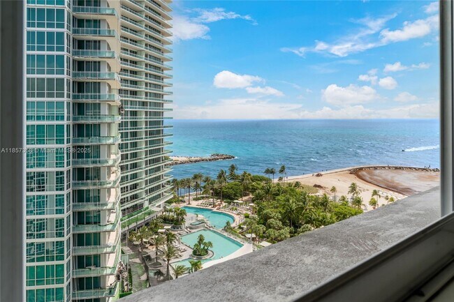 Building Photo - 10275 Collins Ave
