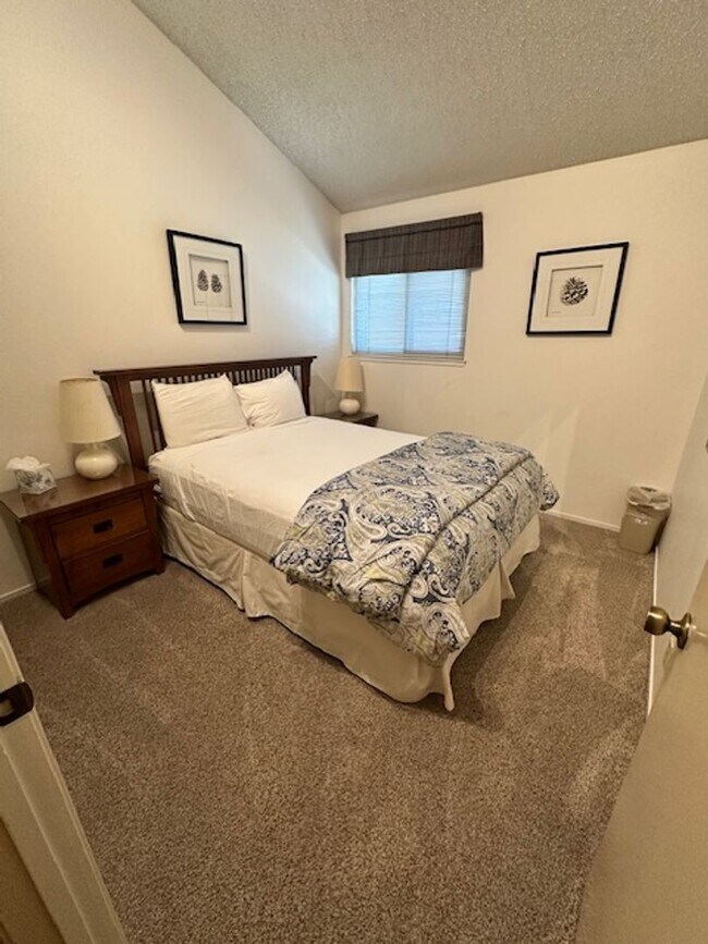 Building Photo - Condo with beautiful channel views and boat slip available for a Winter or Summer seasonal 3-6 mo...