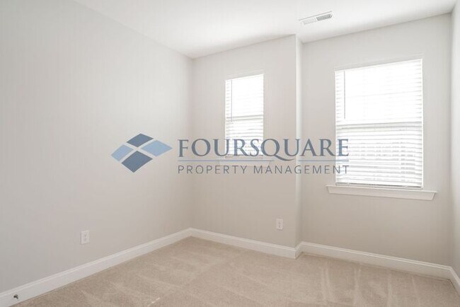 Building Photo - Spacious  End-Unit Townhome | Rear Deck & 2-Car Garage  | Near Brier Creek