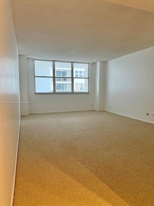 Building Photo - 6039 Collins Ave