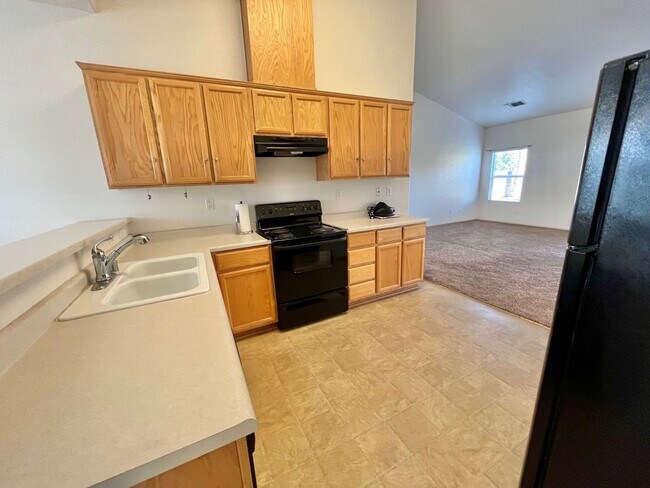 Building Photo - Large Corner Lot Home with Landscaping included!