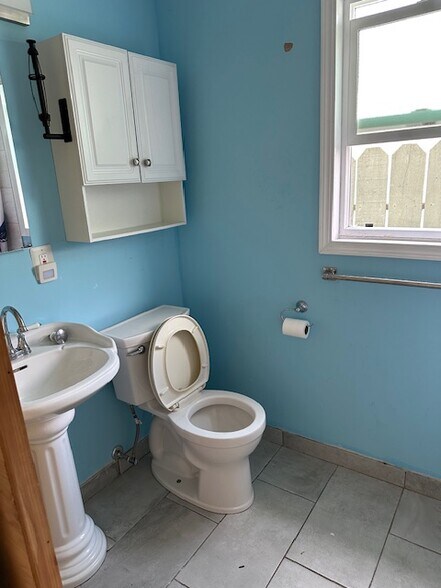 Bathroom one - 1606 Elm St
