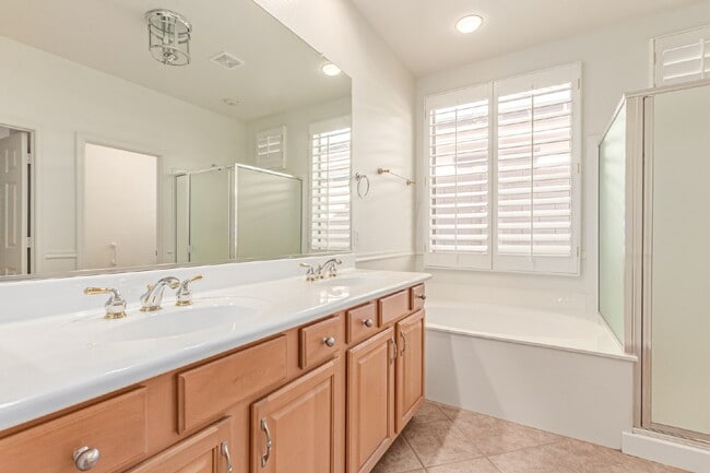 Building Photo - "Charming 2-Bedroom + Den Oasis with Spaci...