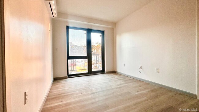 Building Photo - 70-25 Queens Blvd