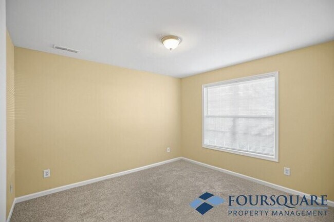 Building Photo - Charming 3-Bedroom Townhome with First-Floor Suite & Off-Street Parking – Near Capital Blvd & I-440